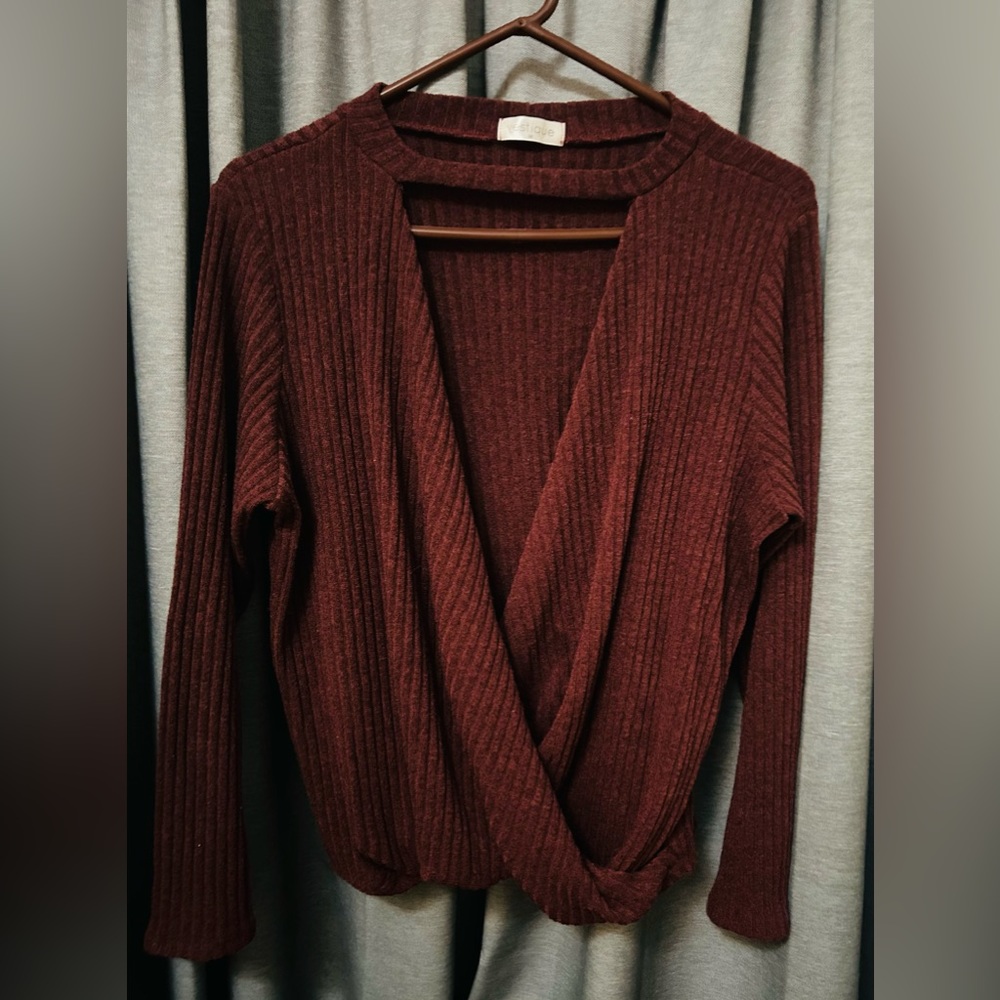 Dark purple/brownish vestique sweater size medium